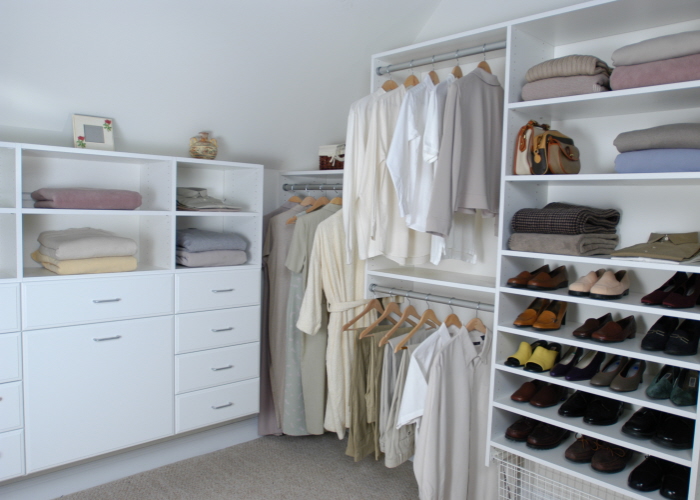 Angled_ceiling_white_walk-in_closet.jpg